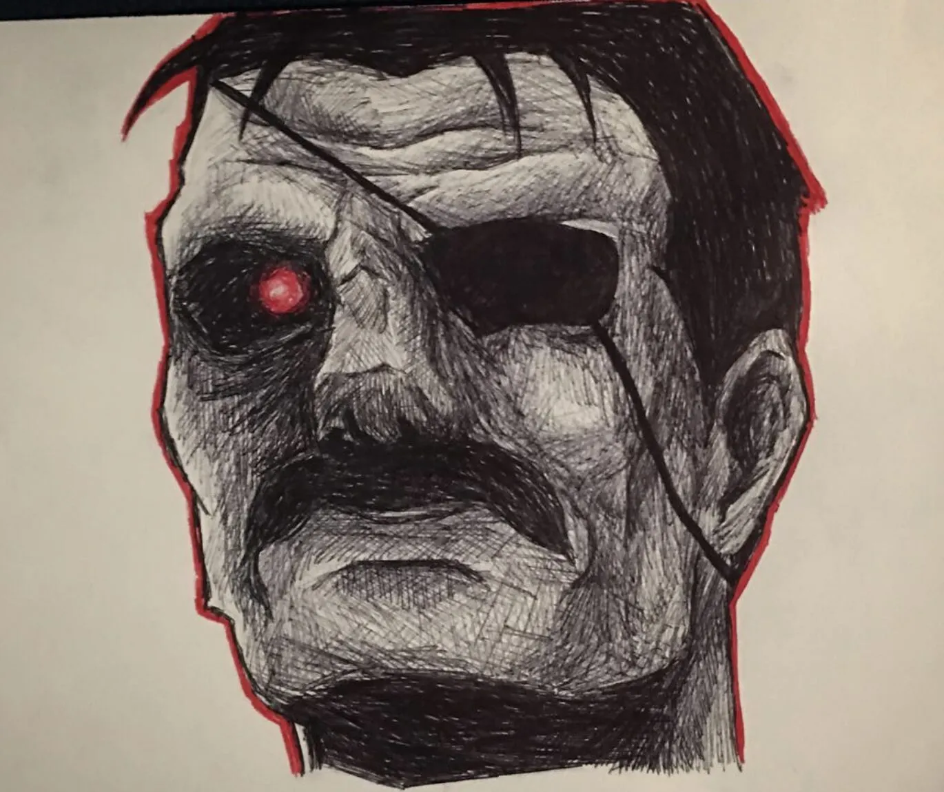 A man with an eyepatch and a red eye