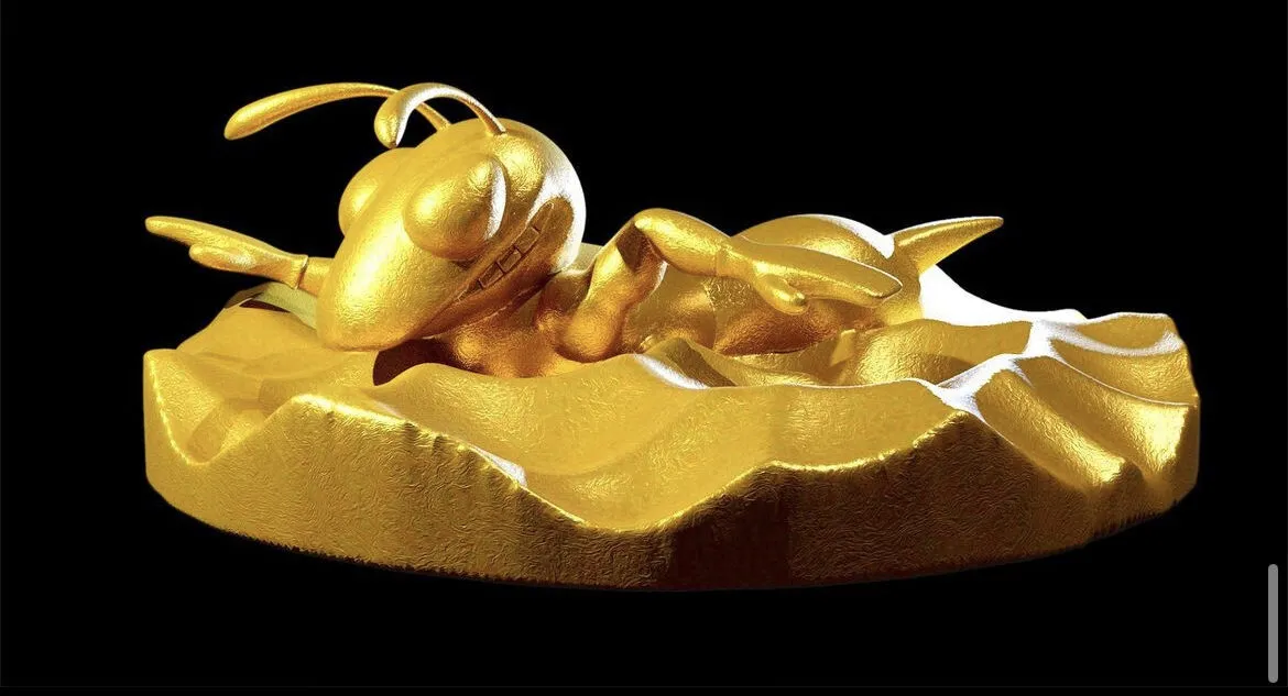A golden bug sculpture