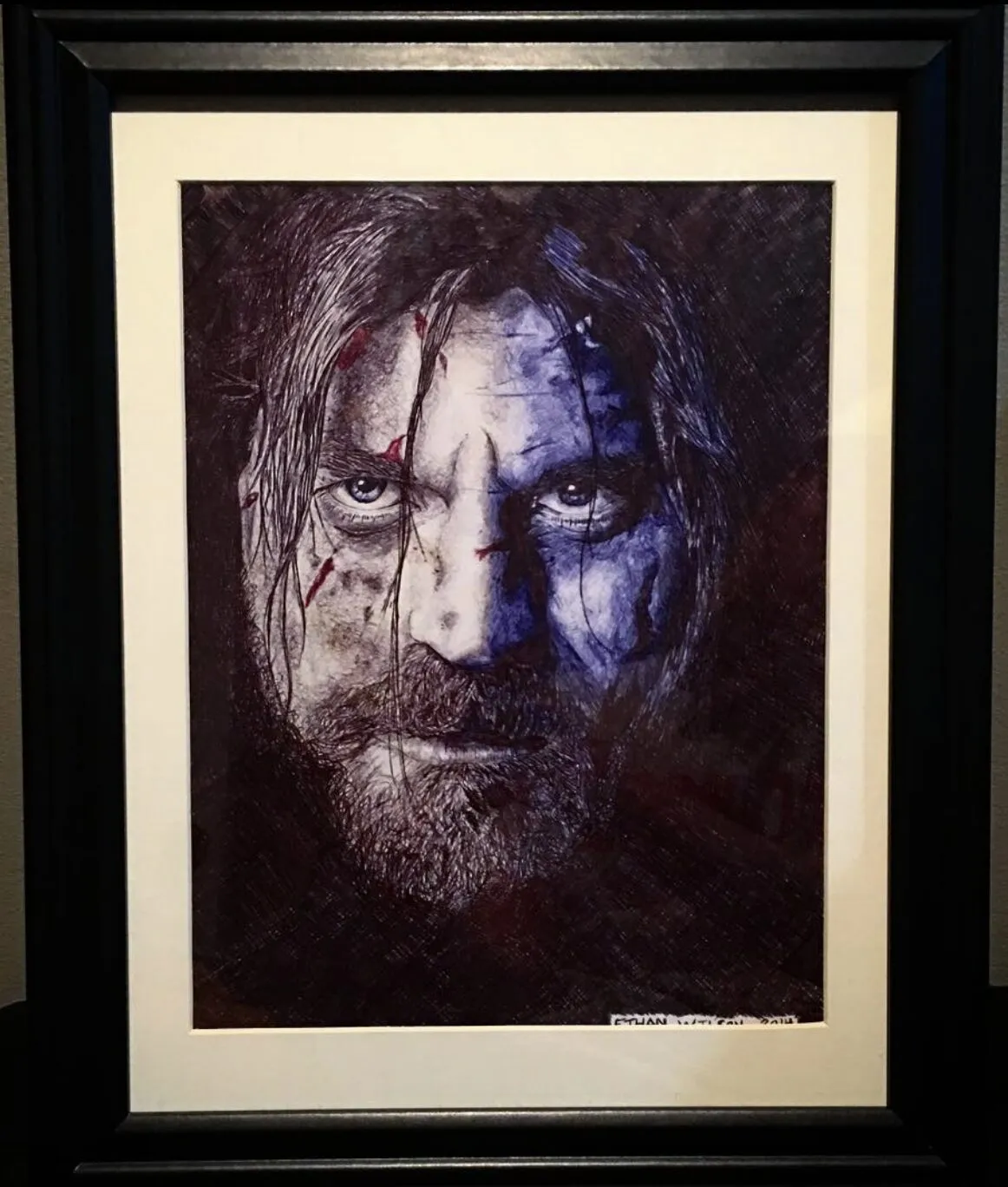 Framed portrait of a bearded warrior