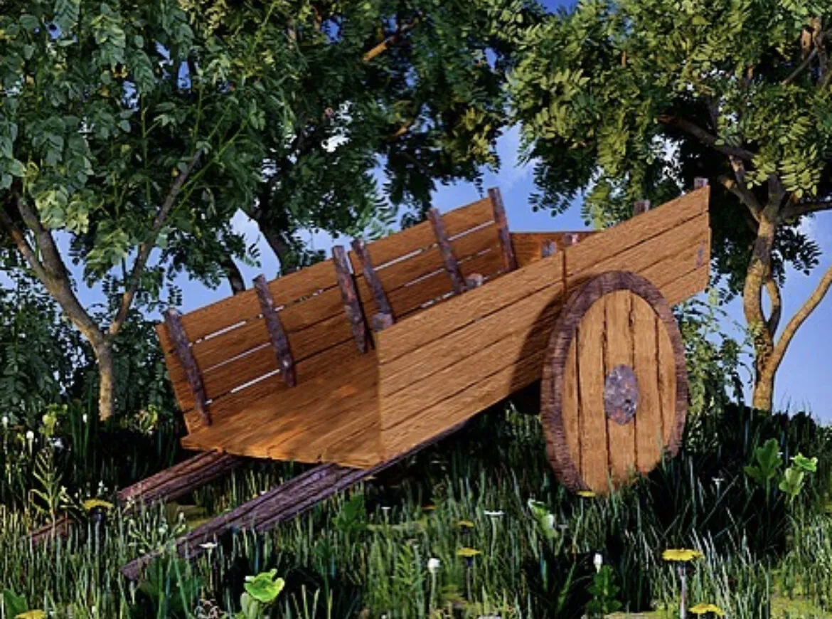 A wooden cart in long grass